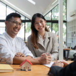 unmarried couple talking with lawyer about estate planning