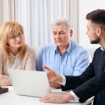 Do You Need an Irrevocable Life Insurance Trust, Senior couple at notary public office